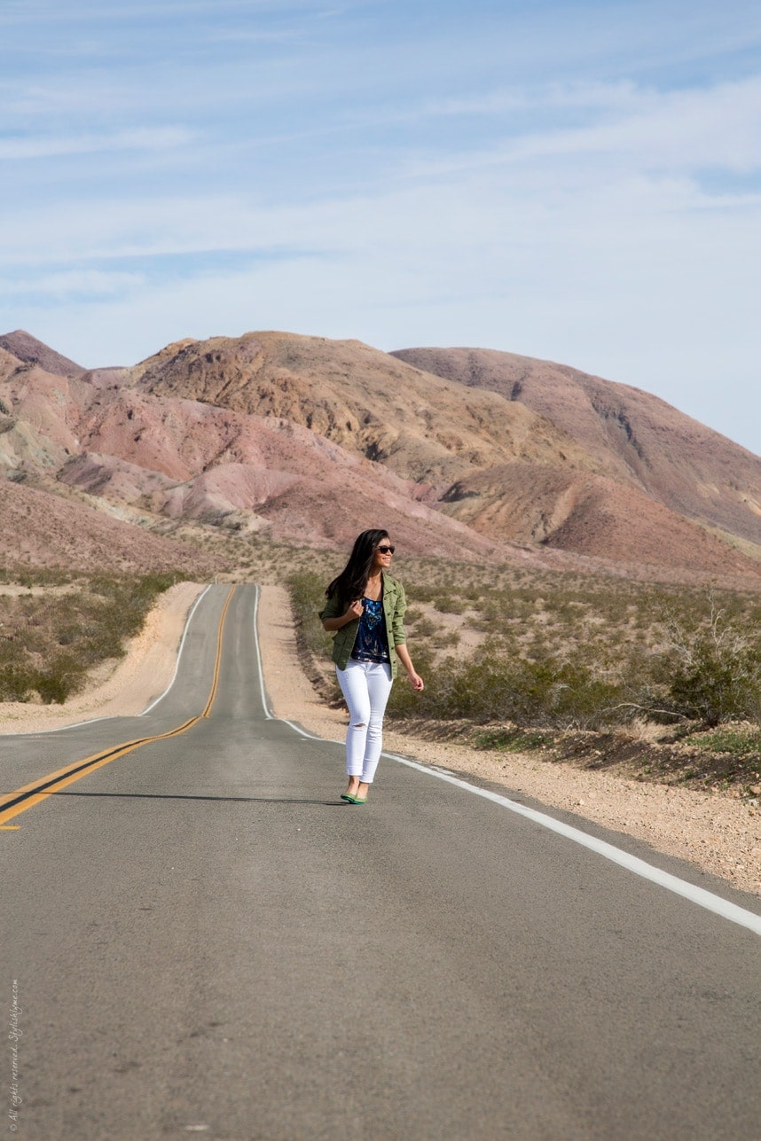 white jeans and olive green jacket - casual road trip outfit